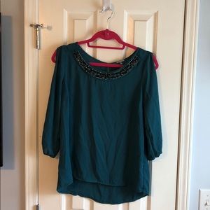 A green jeweled blouse!